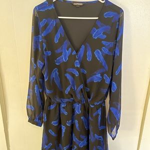 Blue and black romper. 100% polyester.
